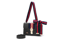 Andrya Shoulder bag with Top Handle; Red, Black, White