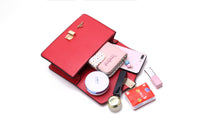 Andrya Shoulder bag with Top Handle; Red, Black, White