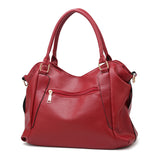 Andrya Soft Leather Cross Body Shoulder bag with Top Handle; Red, Blue.